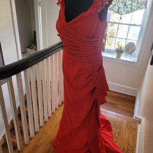 a stunning red, statement formal dress
